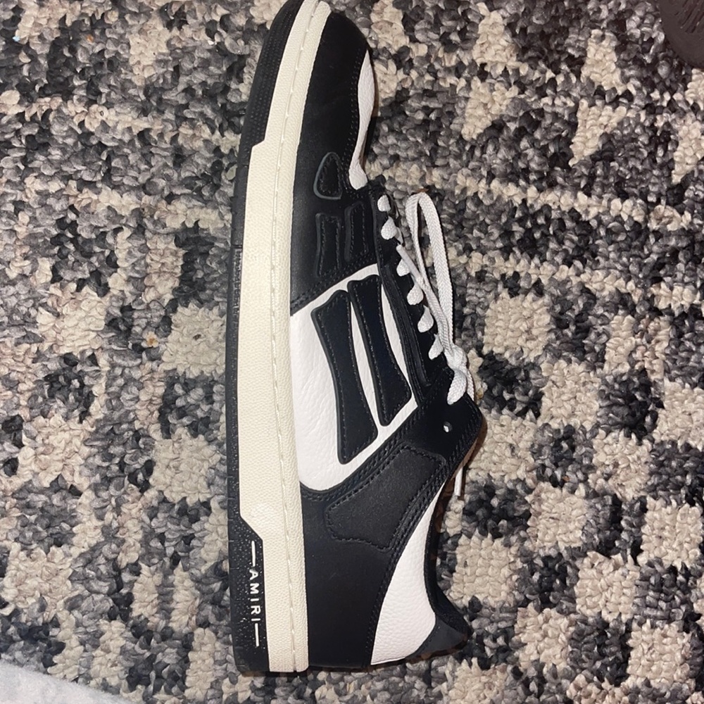 I’m selling Amiri white & black skel sneakers